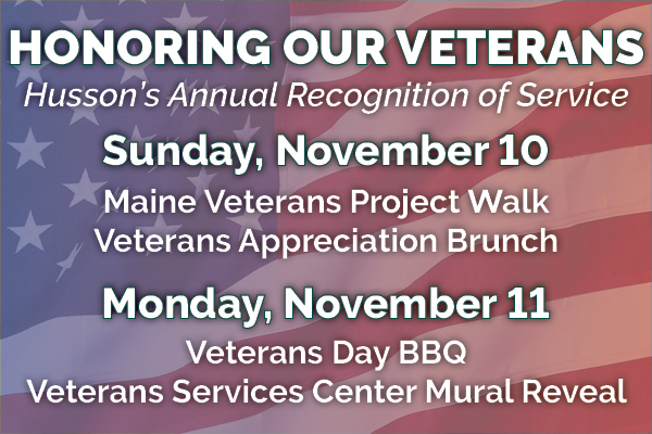 Banner that lists the veterans day events